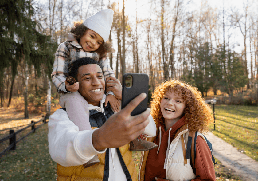 Family taking a selfie outdoors