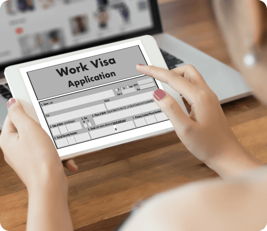Hands holding a tablet with Work Visa Application form