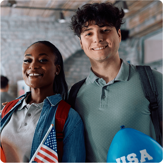Student with laptop and American flag