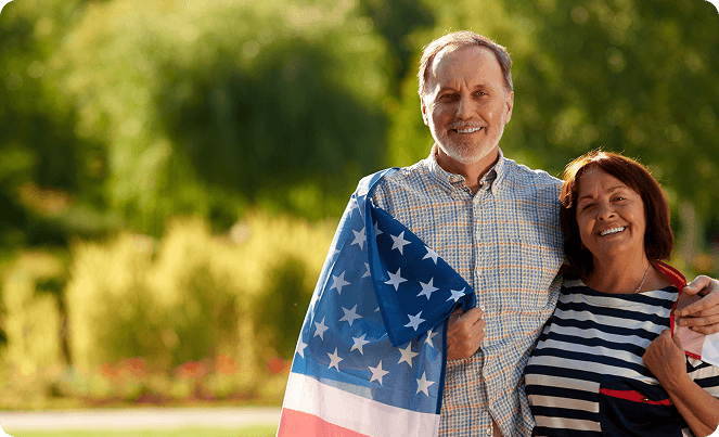 Older couple with American flag