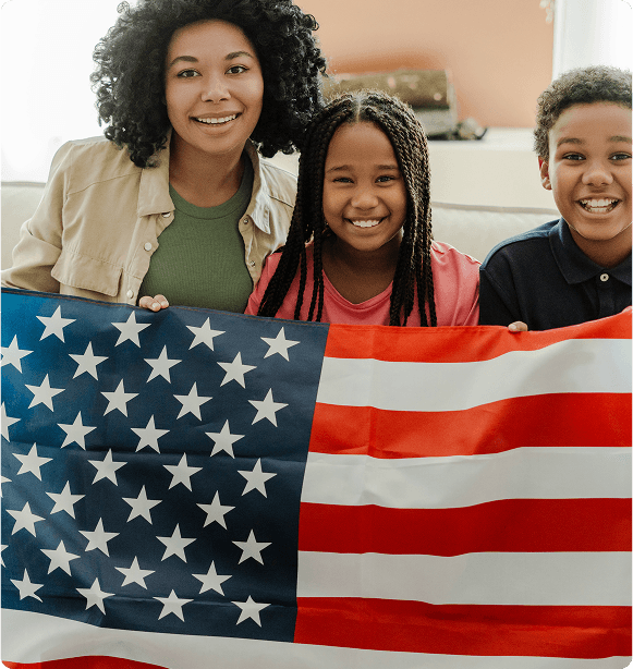 Family with American flag in autumn