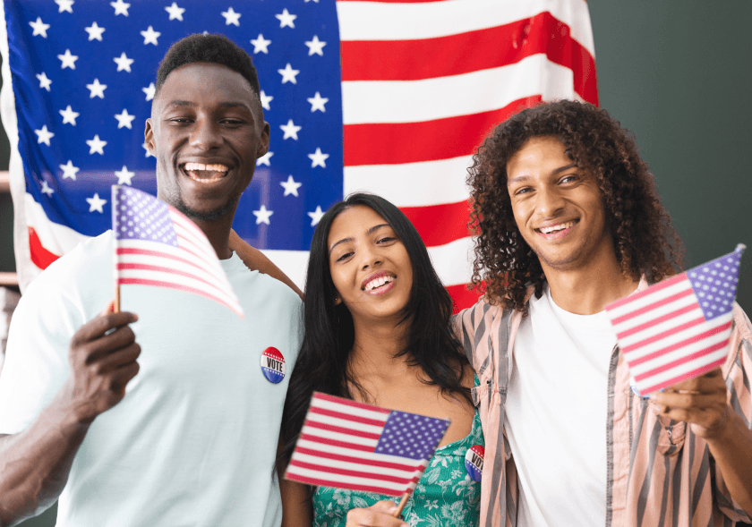 Group of people holding American flags