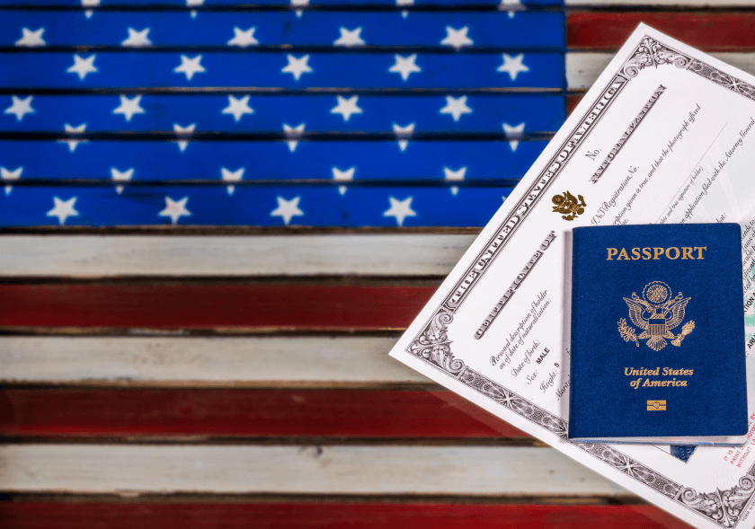 Naturalization certificate and American flag